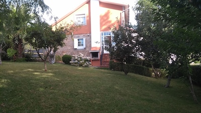 18 km from Santiago. Quiet area and ideal for families. Pets Allowed. 
