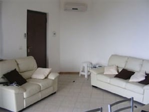 Comfy lounge area with air conditioning and satellite TV etc 