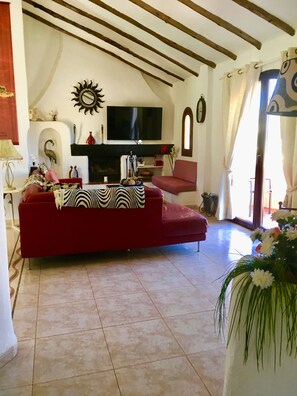 Living room doors to BBQ Terrace