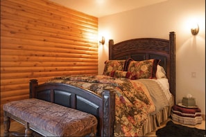 Our second bedroom in the home has a sturdy queen size bed.