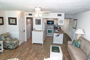 Kitchen and new swivel recliner and new sofa bed purchased in2022. 