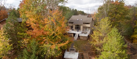 view of the back decks and steps down to our private dock