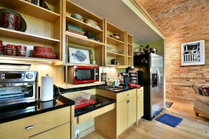 Kitchenette, full refrigerator, air fryer, and all appliances except stove top. 