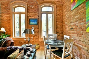 Intimate eating area with seating for 4-8 overlooking Main Street. 