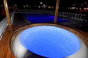 swimming pool also Jacuzzi at night