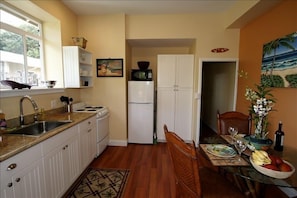 A view of the kitchen from the entry way.