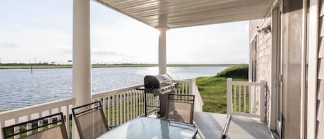 Deck right off the kitchen overlooking the bay