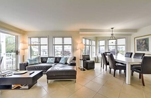 Comfortable living room area with tile flooring