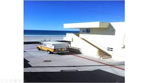 Amazing ocean, sand and boardwalk views from your kitchen and living room