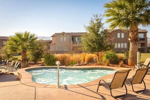 Enjoy community hot tub next to upper pool heated year-round