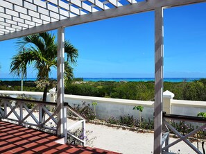 The ocean view from the very large balcony of a two bedroom (plus loft) villa