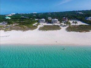 This beach (Grace Bay) is an 8 minute walk (2 min by bike) from our property.