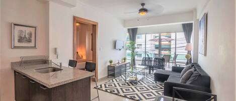 Spacious livingroom with open kitchen, huge private terrace, TV + Fast WIFI