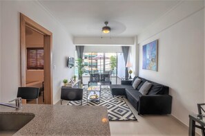 Spacious livingroom with open kitchen, huge private terrace, TV + Fast WIFI