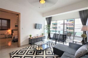 Spacious livingroom with open kitchen, huge private terrace, TV + Fast WIFI