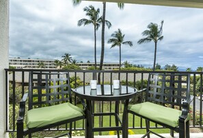 Nice ocean, garden and pool view from lanai of C405 at the Kihei Akahi Resort.