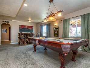 Awesome basement game room with billiards, bar, theater room