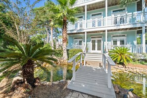 Gulf Pearl entrance with a bridge over the Koi pond