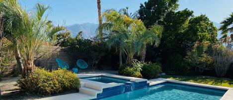 Saltwater pebble pool with magical mountain views in gated backyard
