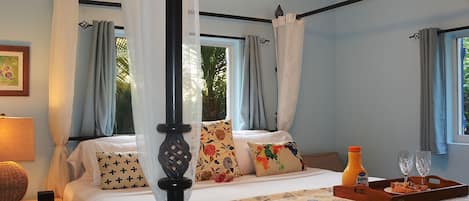 Four poster bed in one bedroom villa.