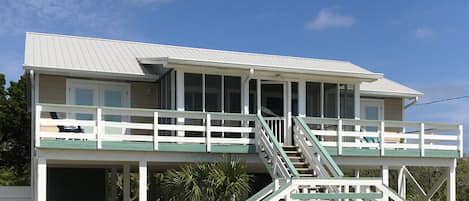 Relax and Enjoy old Florida Beach Living in this conveniently located home.