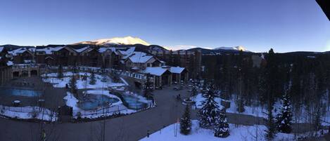 Panoramic view from balcony--huge heated pool/jacuzzi overlooking Peak 9!