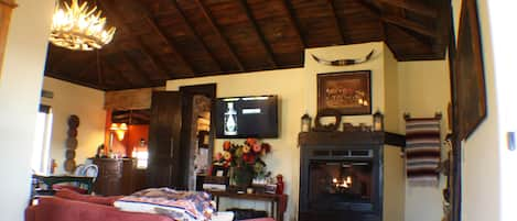 Large propane fireplace and 47” TV 