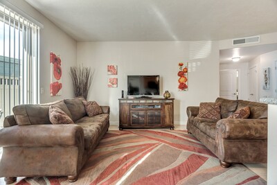 This condo has a very open, modern floor plan that lets families or work colleagues spend time together