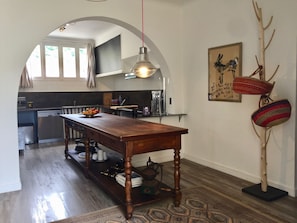 The Kitchen with its unique wooden table from the Hermes factory