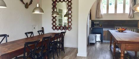 The Kitchen & dining  area with its unique wooden table from the Hermes factory