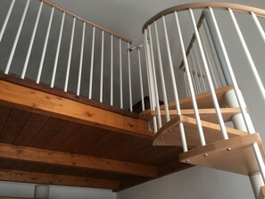 Stairs to the double bedroom on the wooden loft