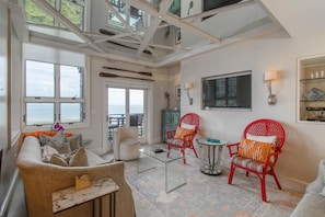 Living Room with Ocean View and Mirrored Ceiling