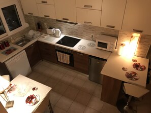 The kitchen and dining area. 