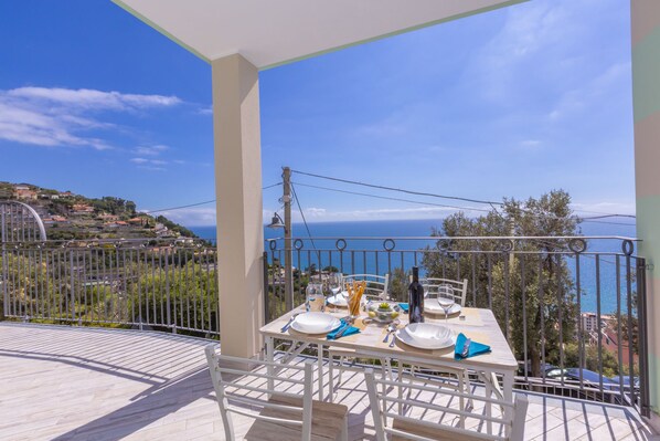Outside terrace with table and seaview