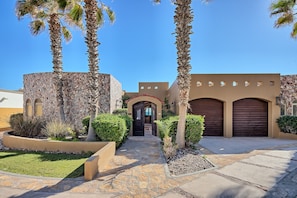 From the front. With 2-car garage and free parking