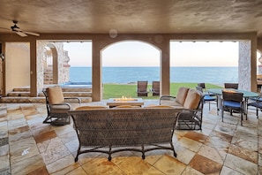 amazing patio with Grill, outdoor living room, jacuzzi, grassy area, etc