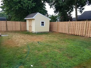 Large yard completely fenced in for privacy.