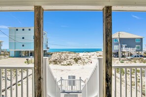 Just steps from the beach and unobstructed Gulf views