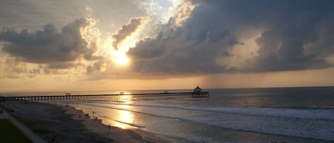 Sunrise over the pier from our private balcony.