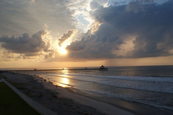 Sunrise over the pier from our private balcony.