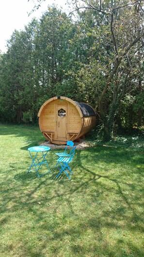 barrel bunkie with table and king size sleeping platform inside