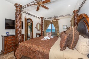 Master suite with access to the beach.  King bed with working area and sitting.