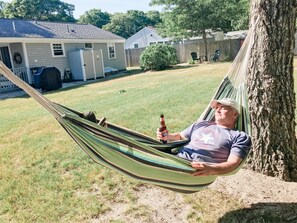 Imagine relaxing in the hammock after a day at the beach with a cool drink!