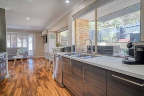 Kitchen through to Lounge.