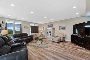 Living room - Huge TV a plenty of seating, perfect for movie nights