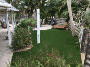 Turfed front yard great and front yard foot wash & shower
