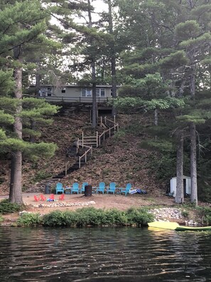 Camp with stairs down to private beach where you can grill, have a fire or swim!
