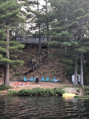 Camp with stairs down to private beach where you can grill, have a fire or swim!