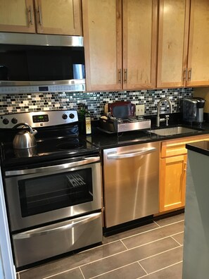 Full Stove, Oven, MIcrowave, Refrigerator, and Keurig