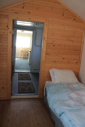 Twin bedroom (looking towards kitchen/dining area)